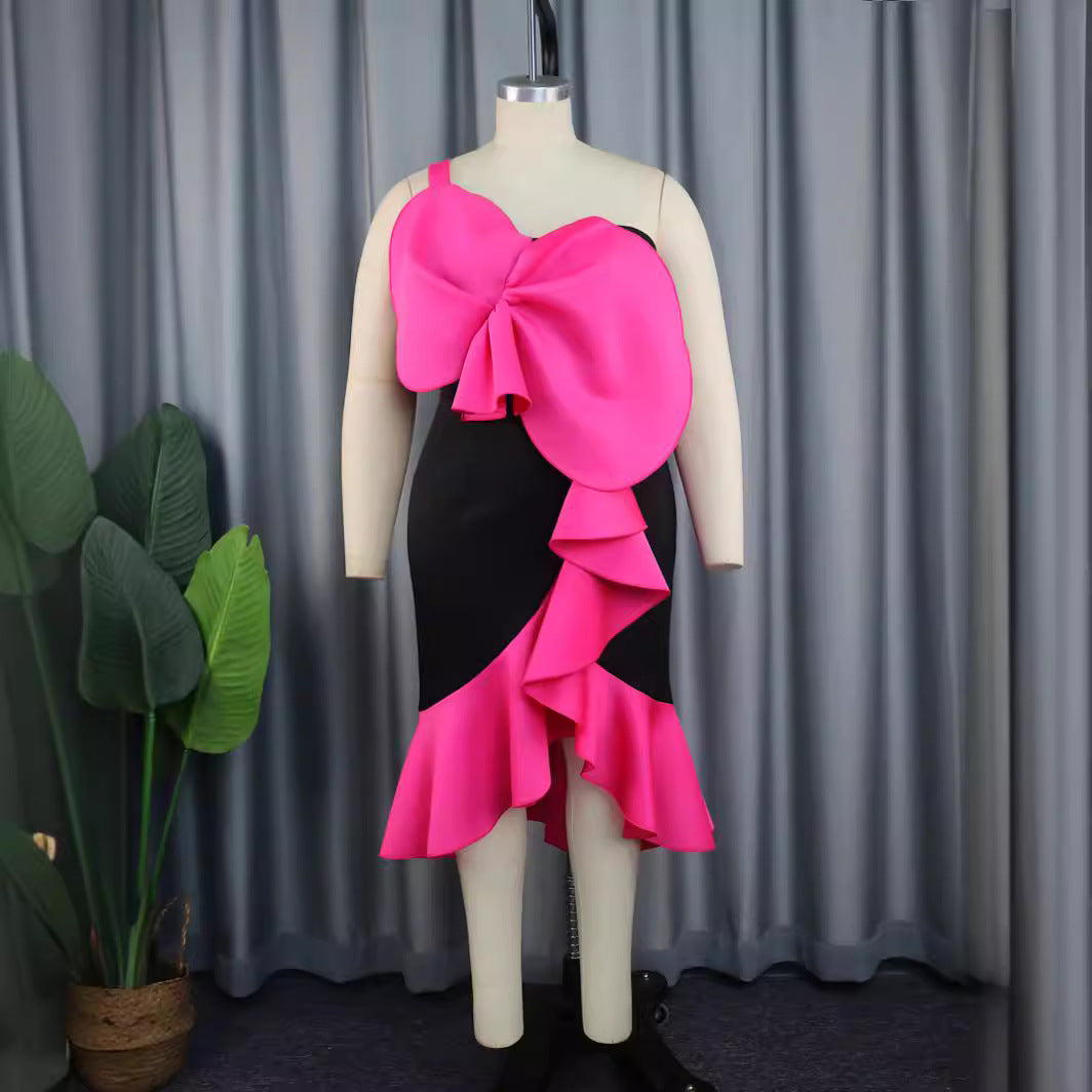 Dame Elegant cocktail dress with statement ruffle design and plus size Mirla-Eva Jonsson