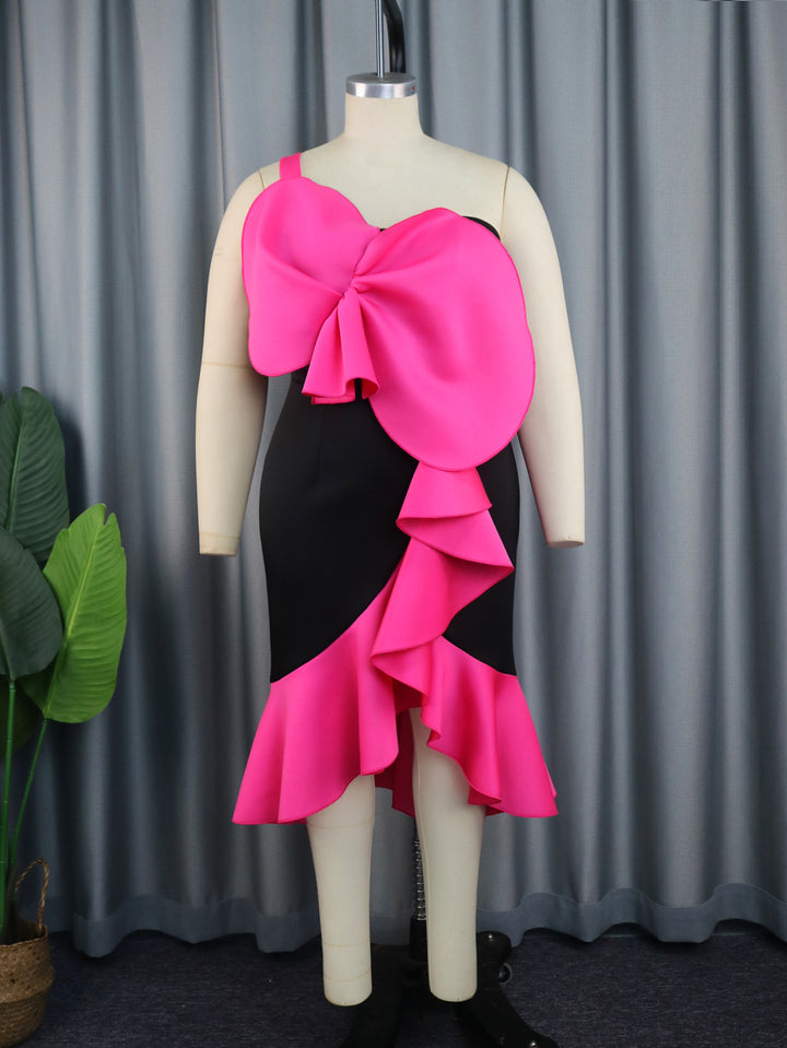 Dame Elegant cocktail dress with statement ruffle design and plus size Mirla-Eva Jonsson