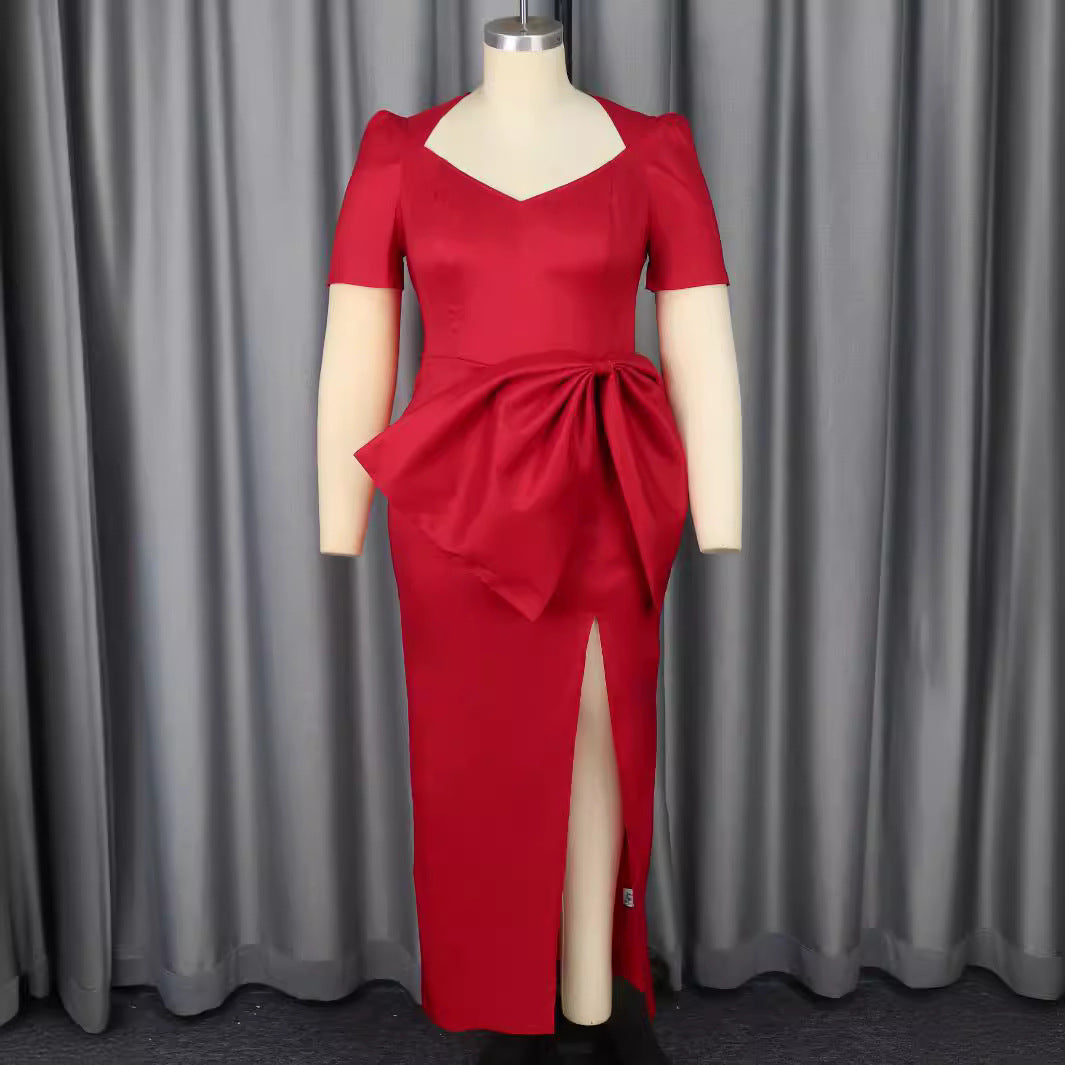 Dame Elegant kvällsklänning med dekorativt knytaccent och hög slits Mirla-Eva Jonsson