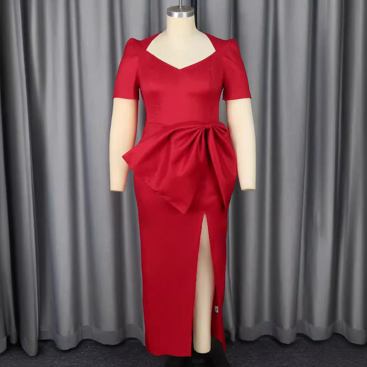 Dame Elegant kvällsklänning med dekorativt knytaccent och hög slits Mirla-Eva Jonsson