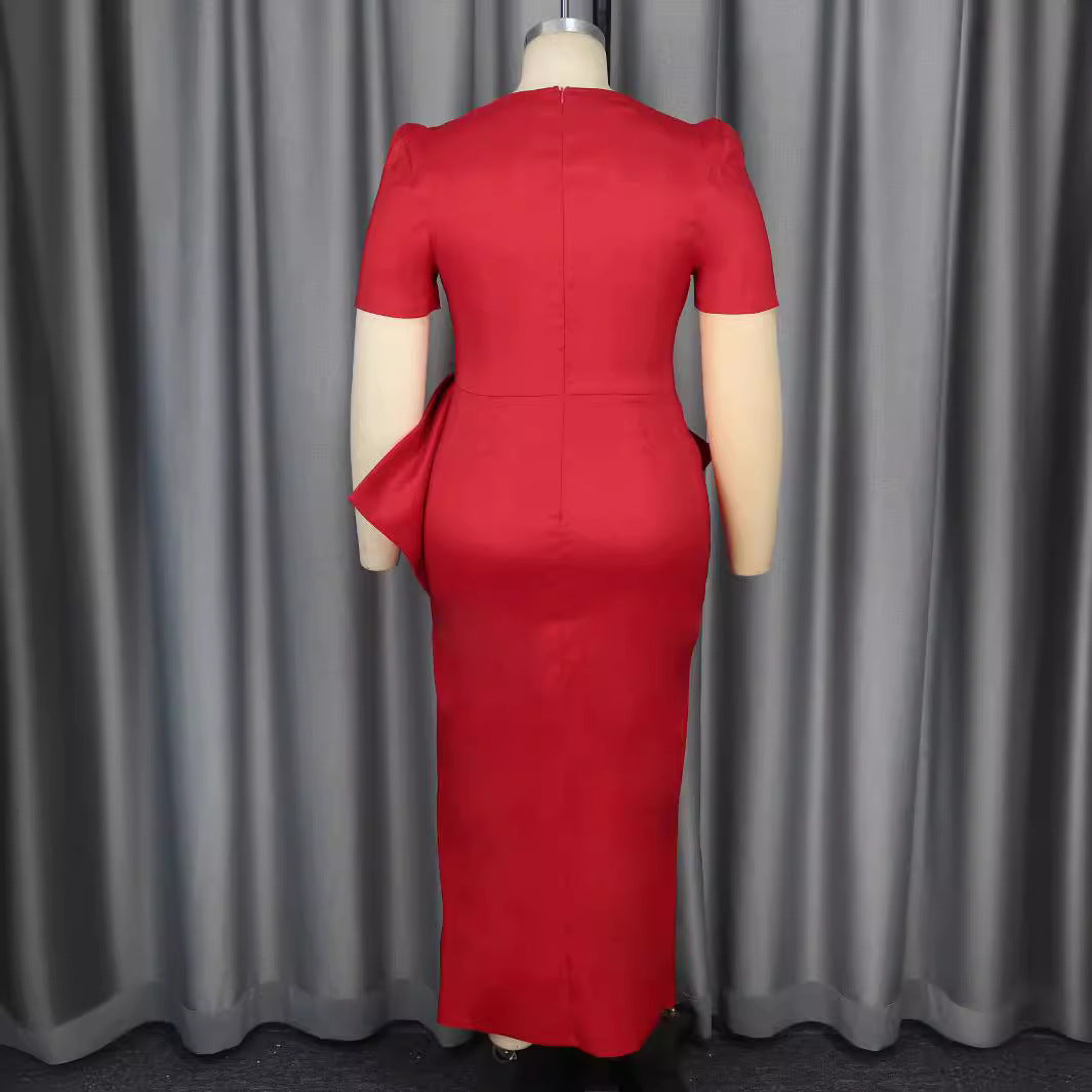 Dame Elegant kvällsklänning med dekorativt knytaccent och hög slits Mirla-Eva Jonsson