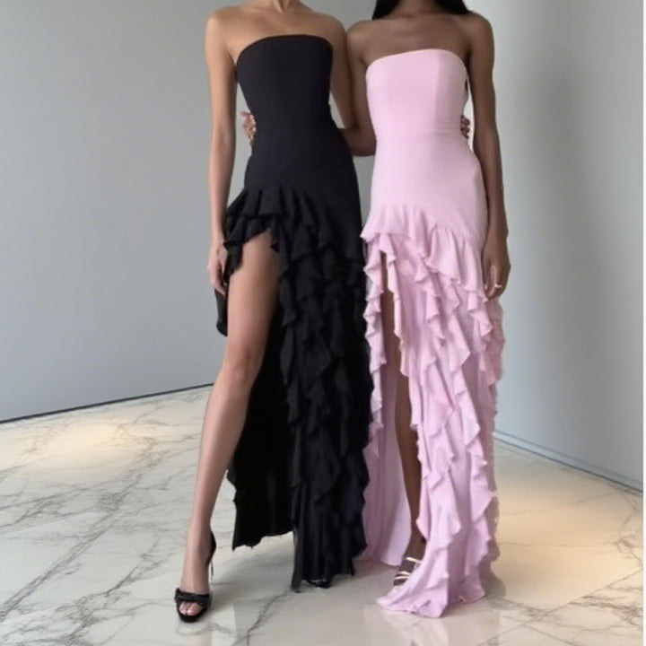Dame Elegant och asymmetrisk aftonklänning med ruffle detaljer Mirla-Eva Jonsson
