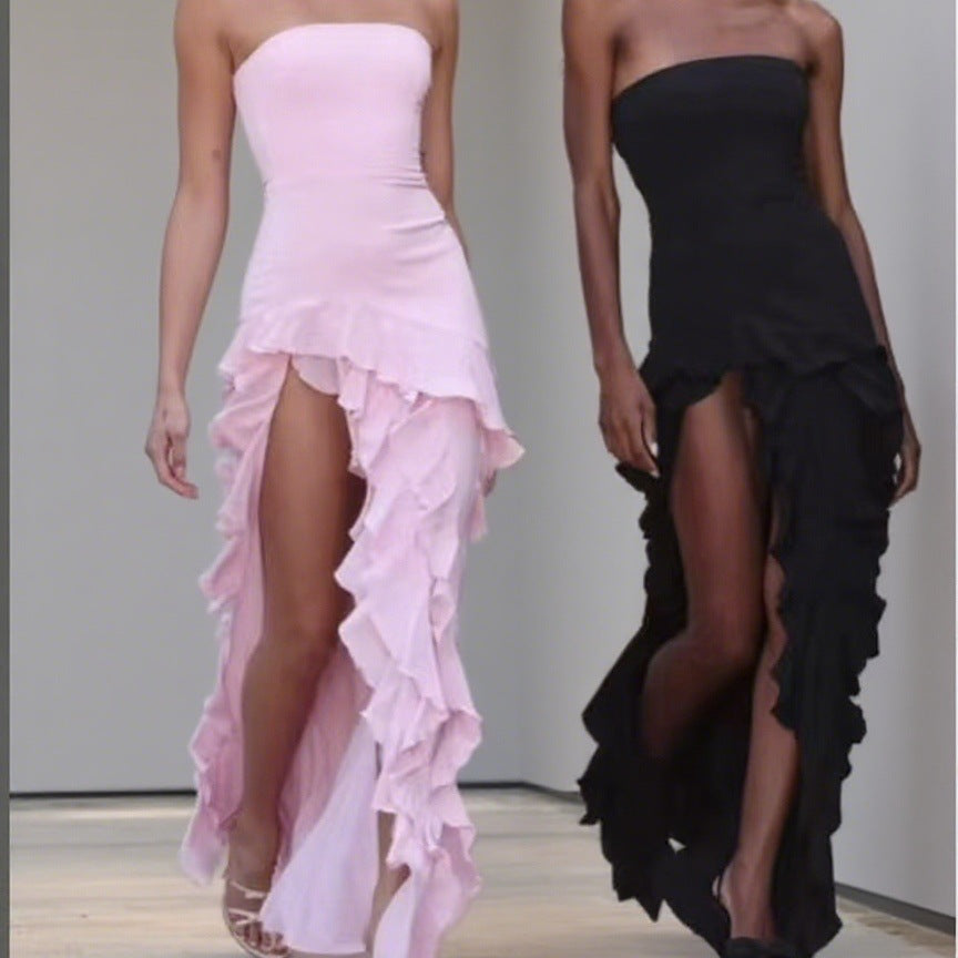 Dame Elegant och asymmetrisk aftonklänning med ruffle detaljer Mirla-Eva Jonsson