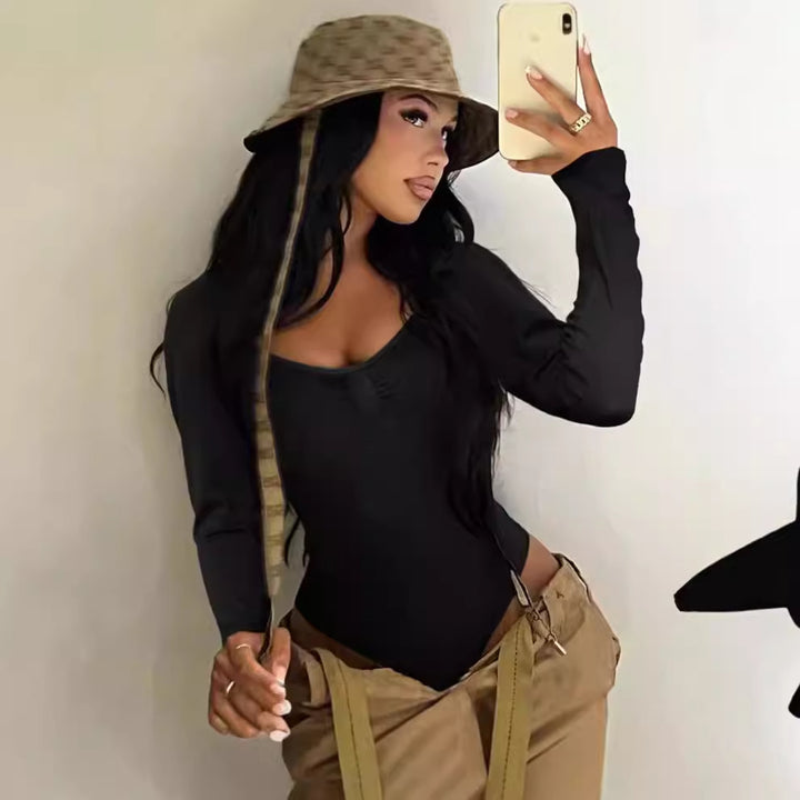 Dame Elegant skuren långärmad bodysuit med volangdetaljer Mirla-Eva Jonsson
