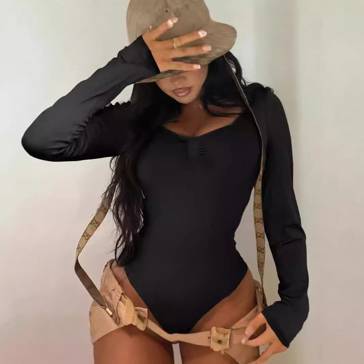 Dame Elegant skuren långärmad bodysuit med volangdetaljer Mirla-Eva Jonsson