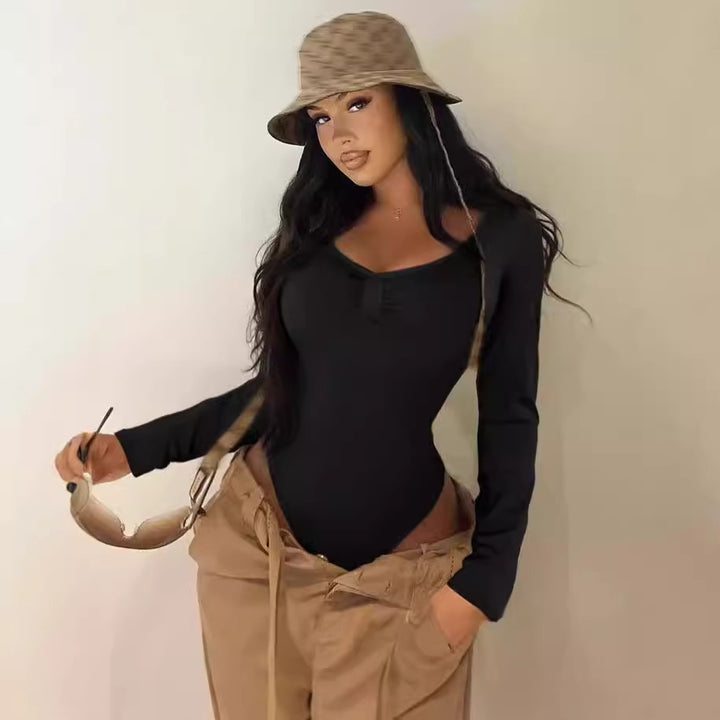 Dame Elegant skuren långärmad bodysuit med volangdetaljer Mirla-Eva Jonsson