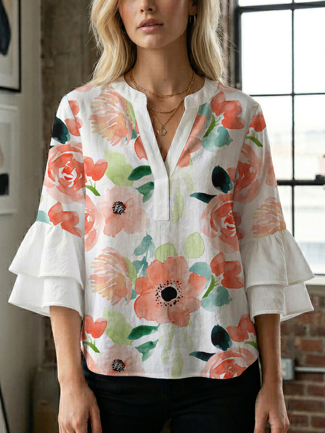 Dame Elegant topp med voluminösa puffärmar och blommönster Mirla-Eva Jonsson