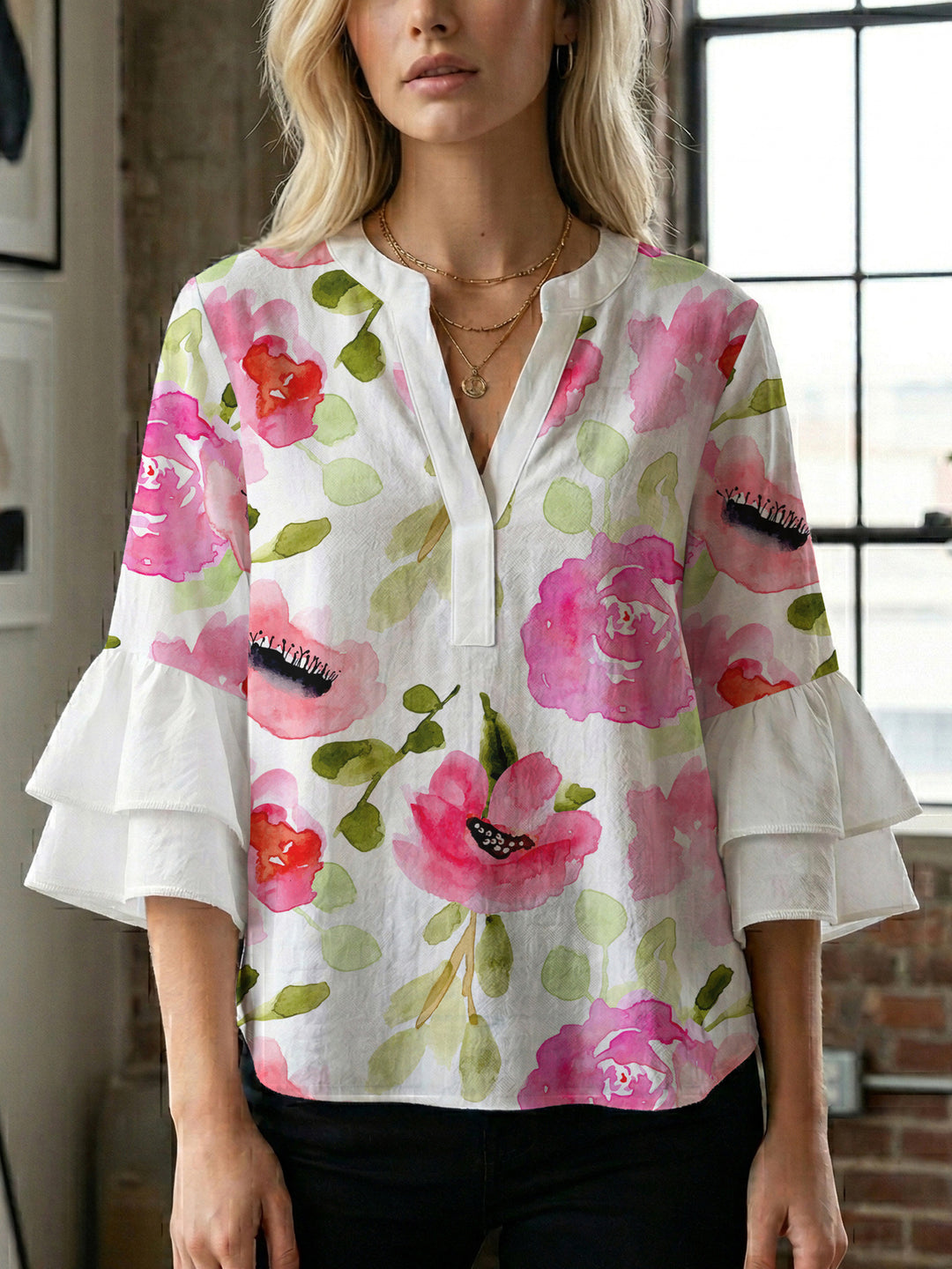 Dame Elegant topp med voluminösa puffärmar och blommönster Mirla-Eva Jonsson