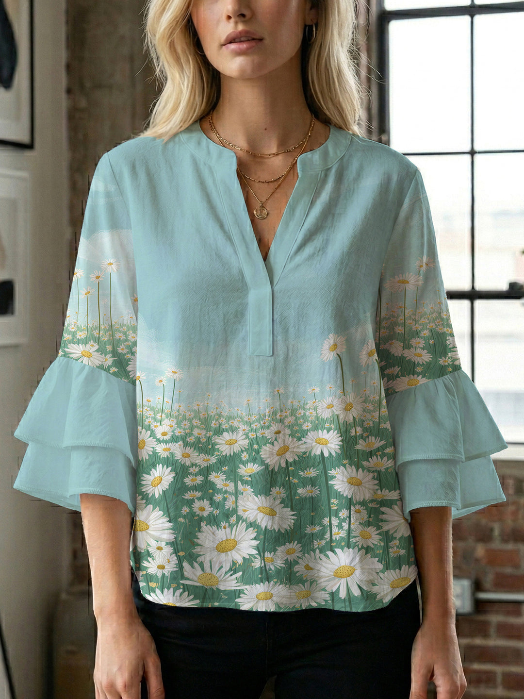 Dame Elegant topp med voluminösa puffärmar och blommönster Mirla-Eva Jonsson
