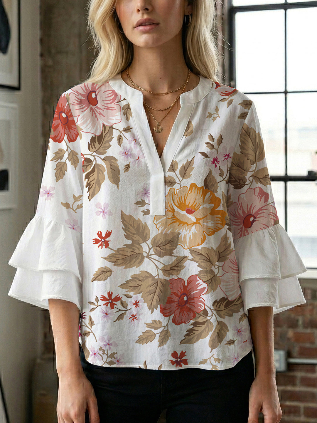 Dame Elegant topp med voluminösa puffärmar och blommönster Mirla-Eva Jonsson
