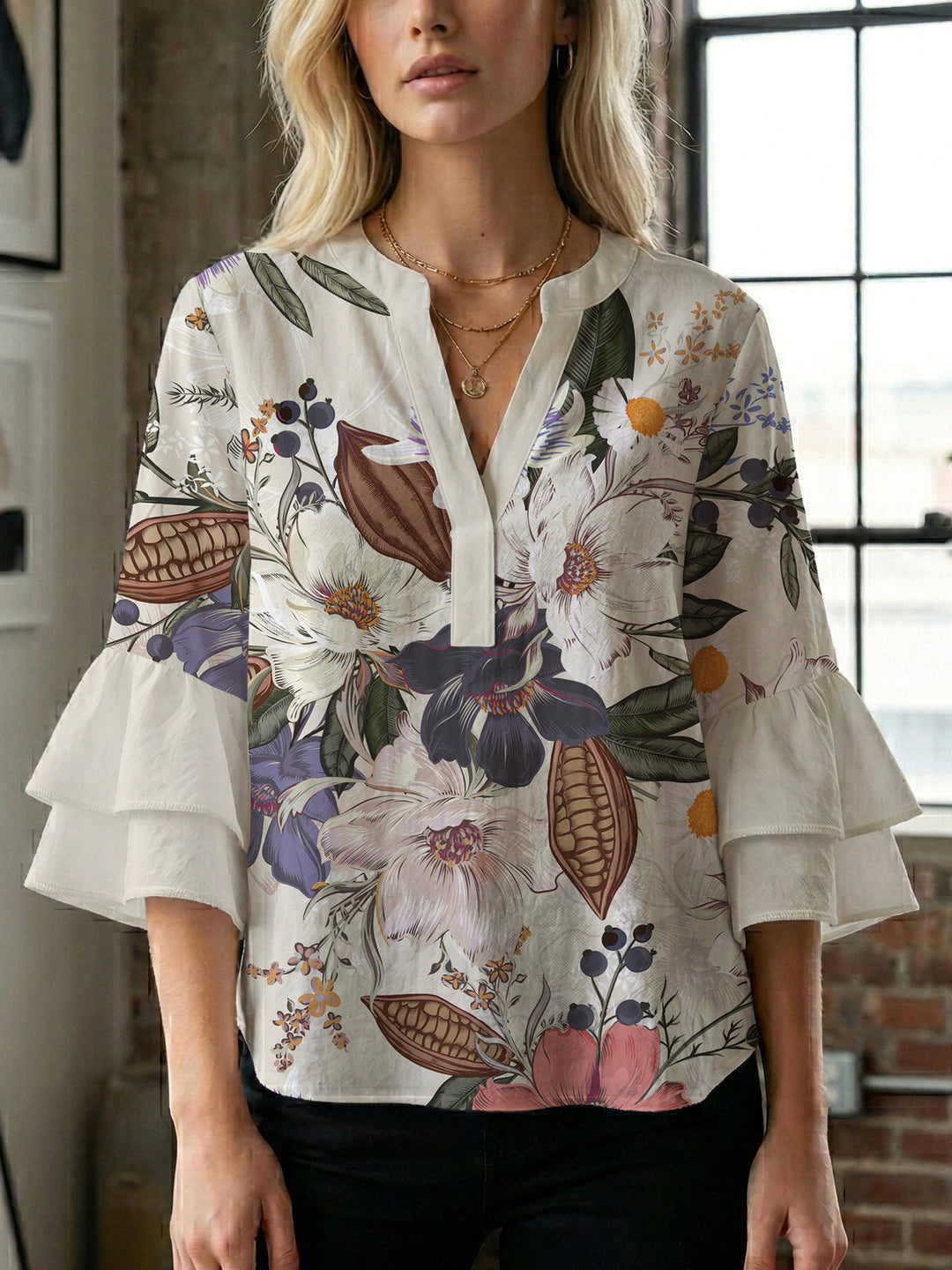 Dame Elegant topp med voluminösa puffärmar och blommönster Mirla-Eva Jonsson