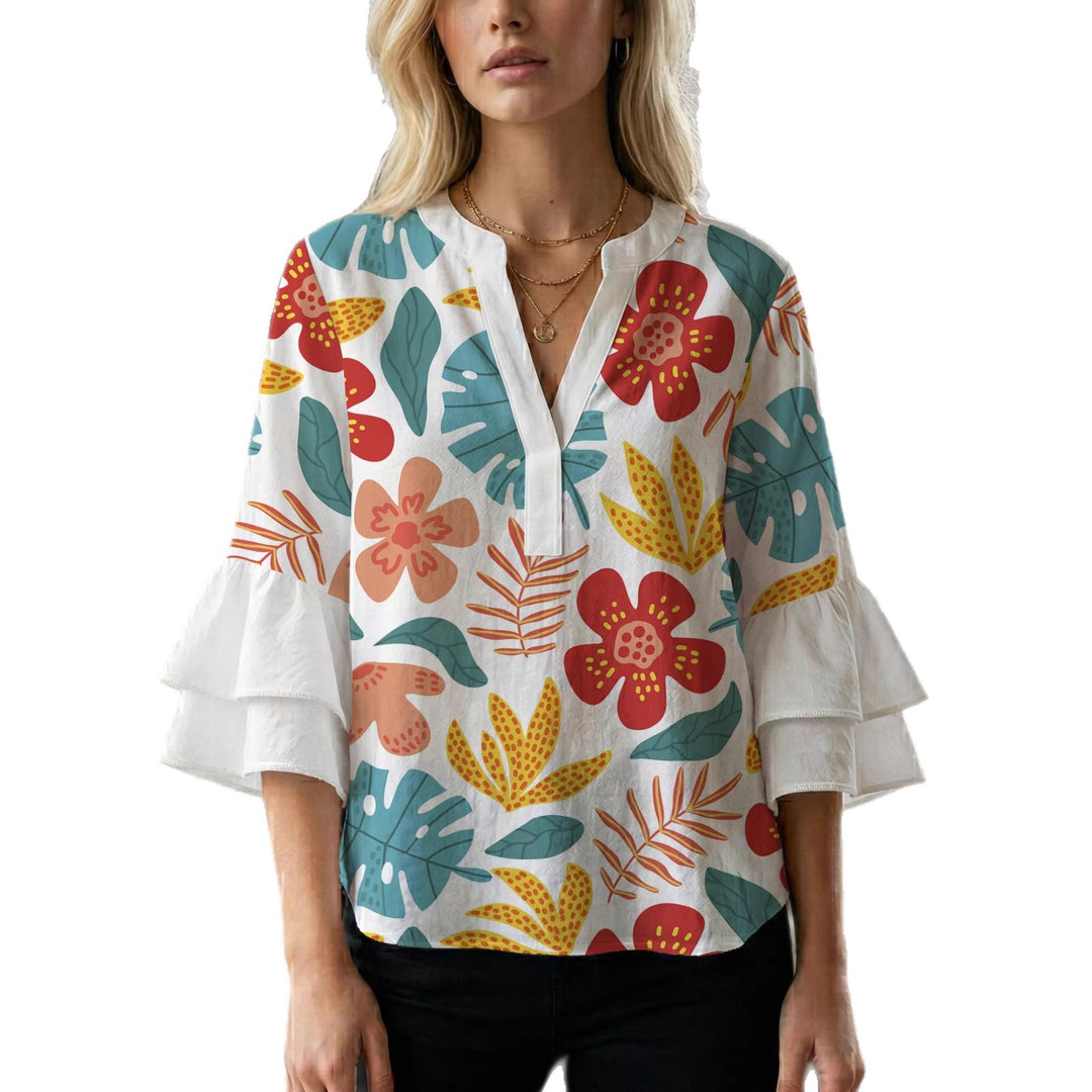 Dame Elegant topp med voluminösa puffärmar och blommönster Mirla-Eva Jonsson