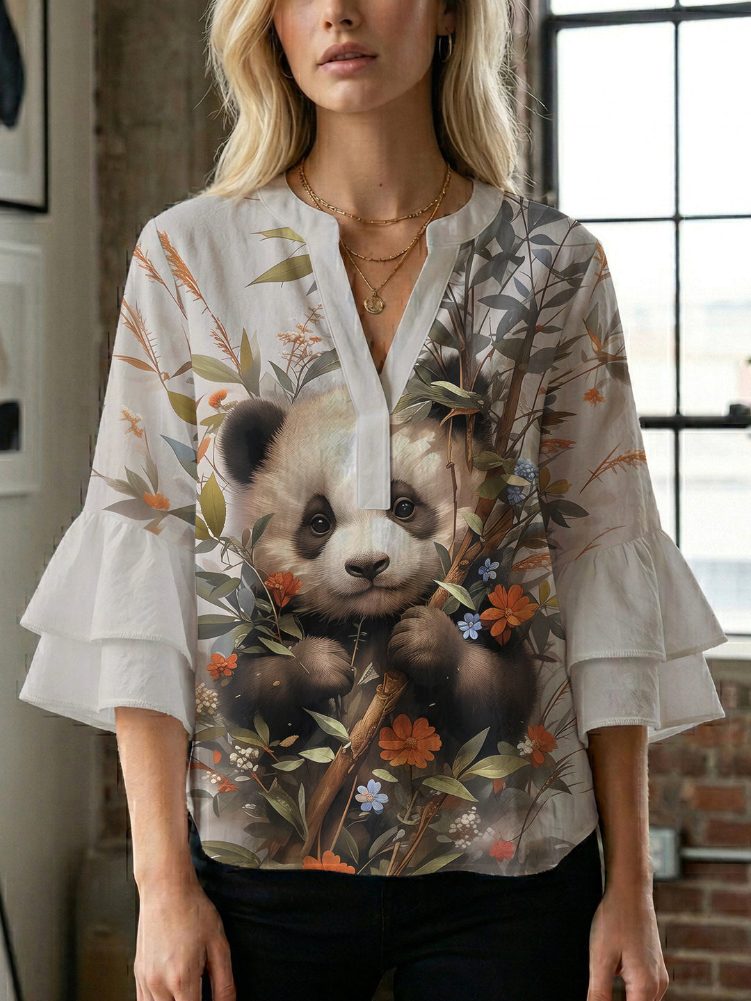 Dame Elegant topp med voluminösa puffärmar och blommönster Mirla-Eva Jonsson