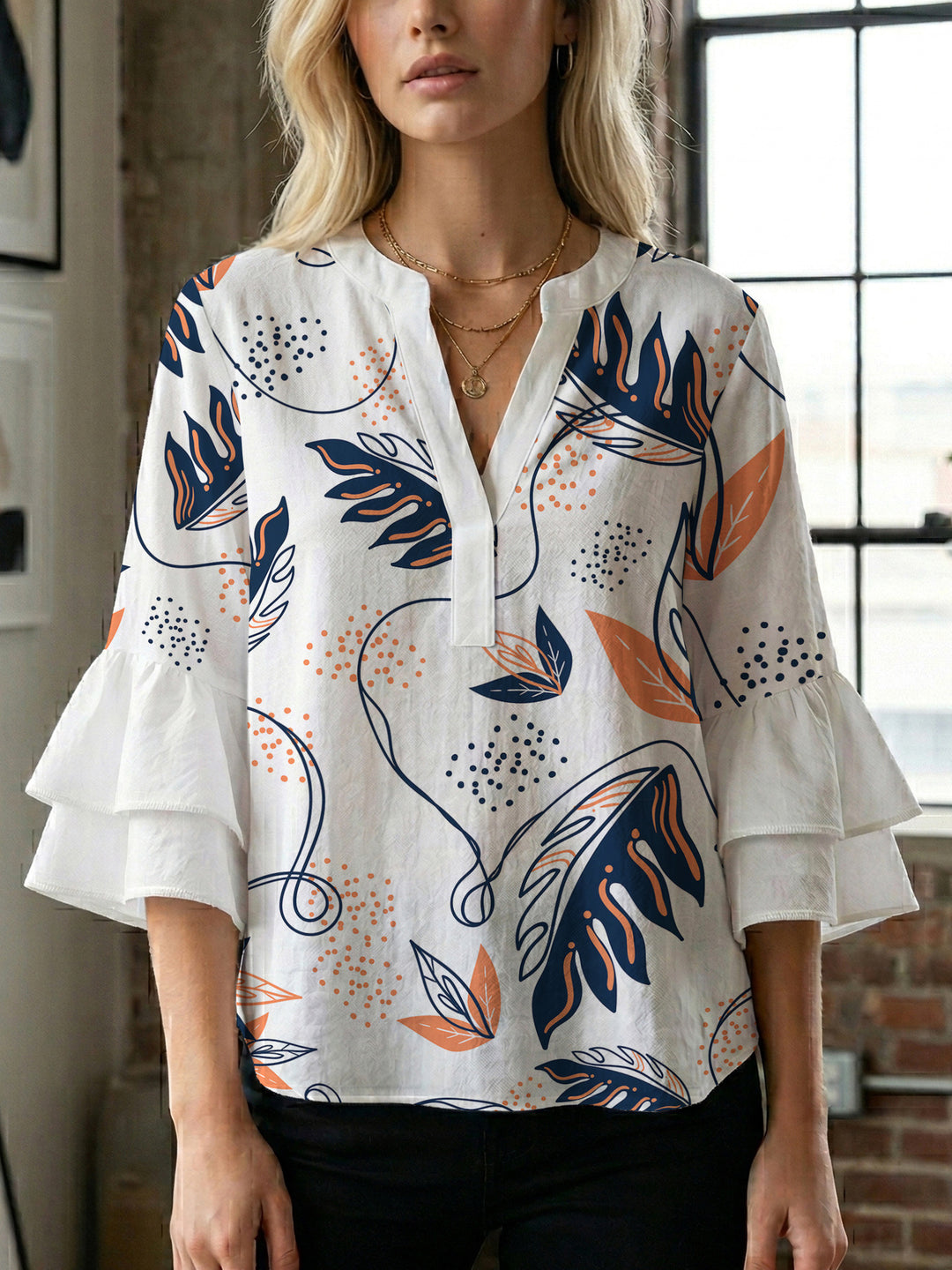 Dame Elegant topp med voluminösa puffärmar och blommönster Mirla-Eva Jonsson