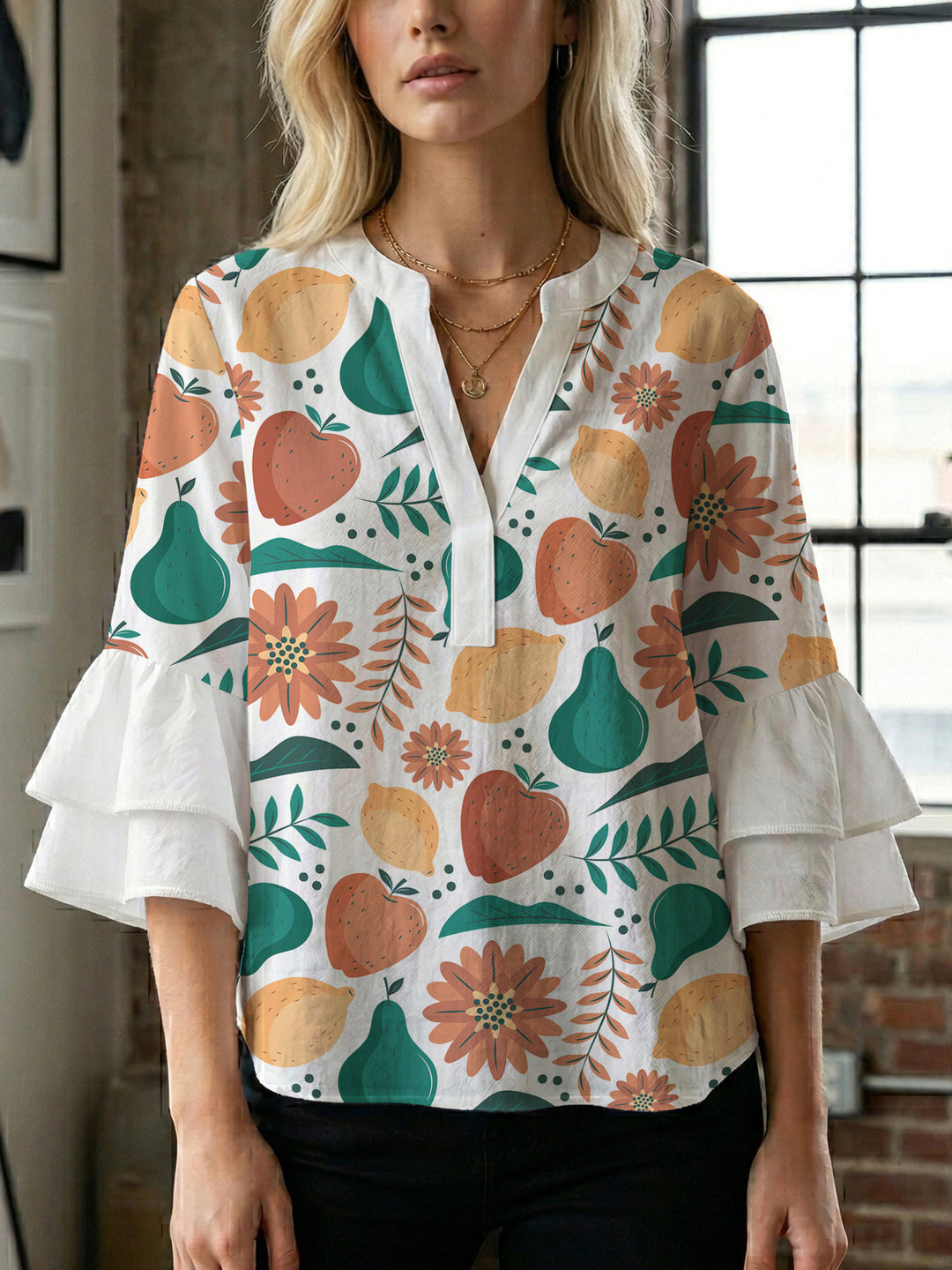 Dame Elegant topp med voluminösa puffärmar och blommönster Mirla-Eva Jonsson