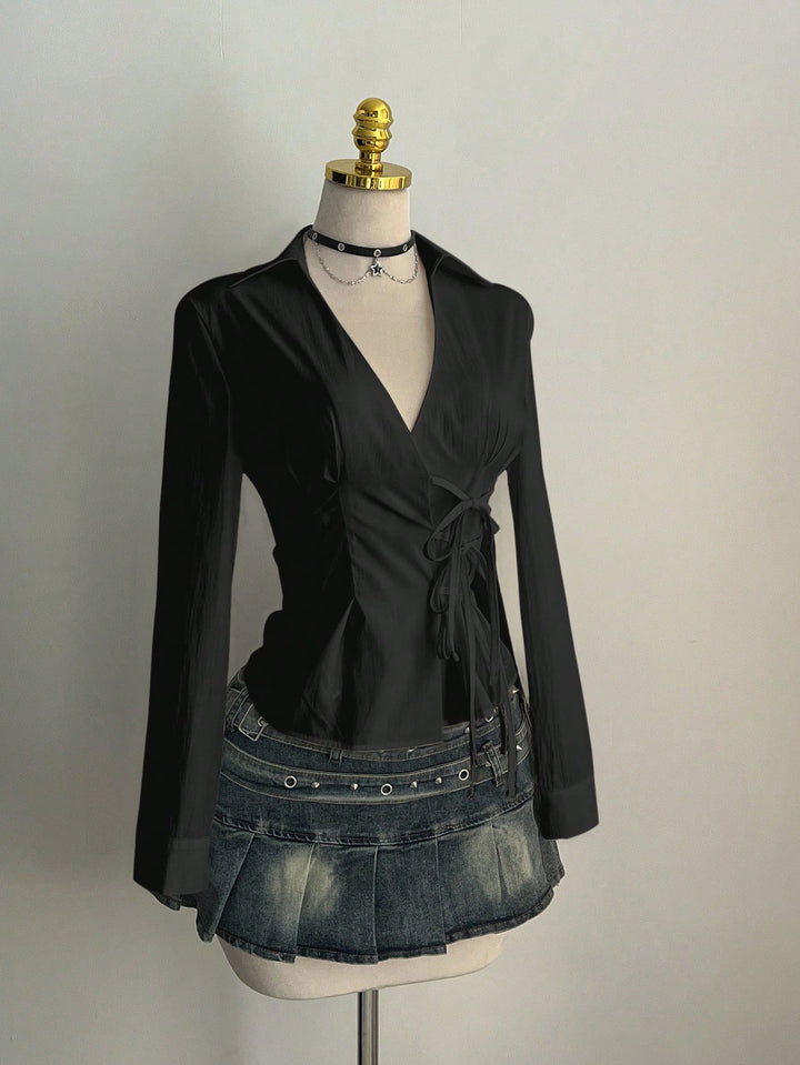 Dame Elegant wrap top with fine ruffle details Mirla-Eva Jonsson