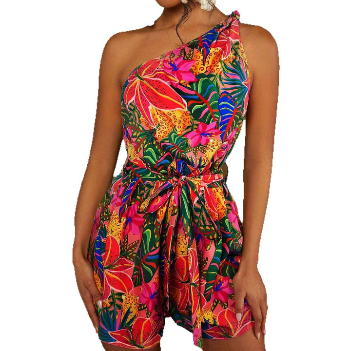 Dame En Axel Playsuit med blommönster och midjeskärp Mirla-Eva Jonsson
