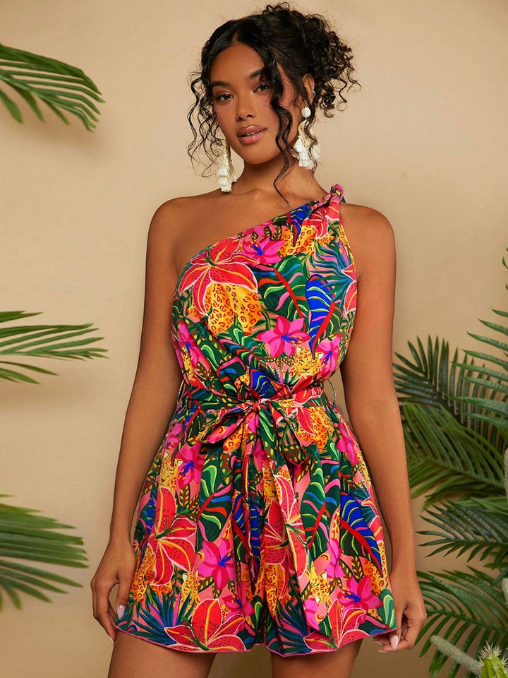 Dame En Axel Playsuit med blommönster och midjeskärp Mirla-Eva Jonsson