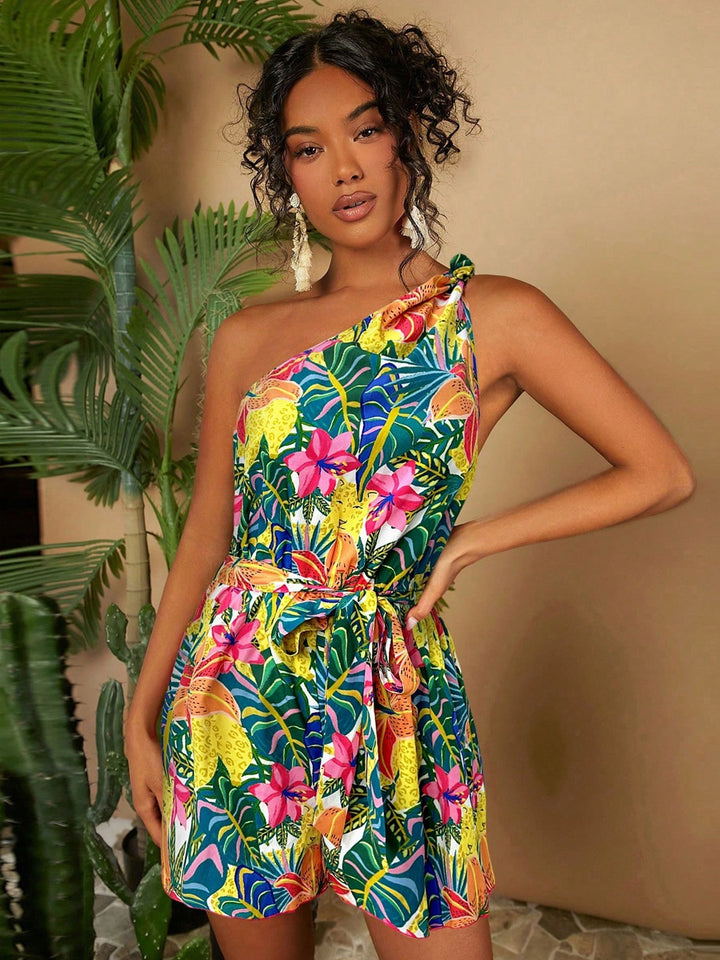 Dame En Axel Playsuit med blommönster och midjeskärp Mirla-Eva Jonsson
