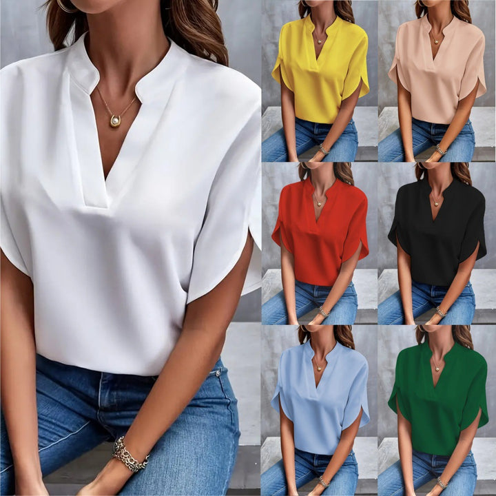 Dame Fashion blus med ståkrage och flödande ärmar Mirla-Eva Jonsson