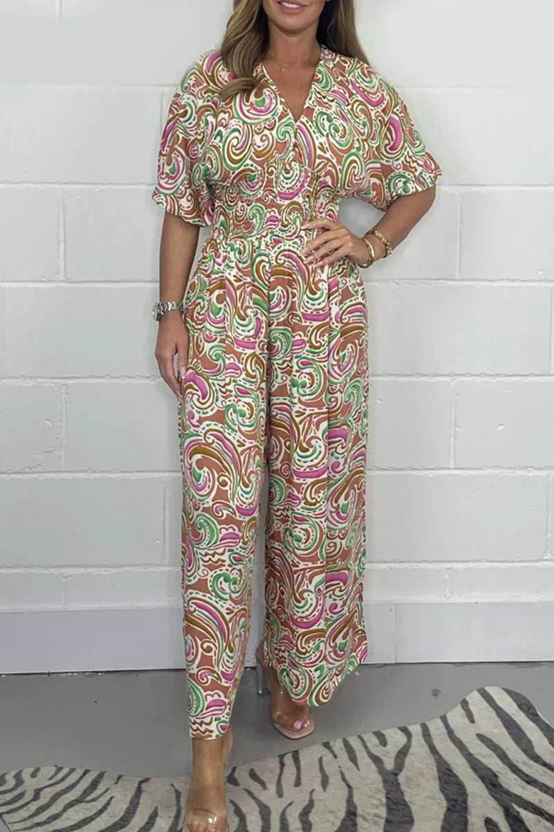 Dame Flödande Jumpsuit med elegant paisleymönster och midjeformning Mirla-Eva Jonsson