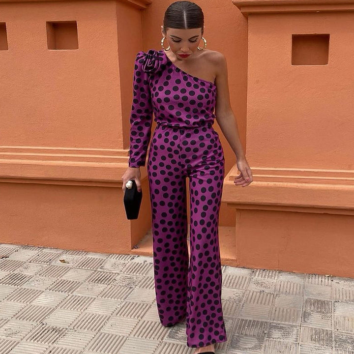 Dame Glamoröst Jumpsuit med asymmetrisk design och volangdetalj Mirla-Eva Jonsson