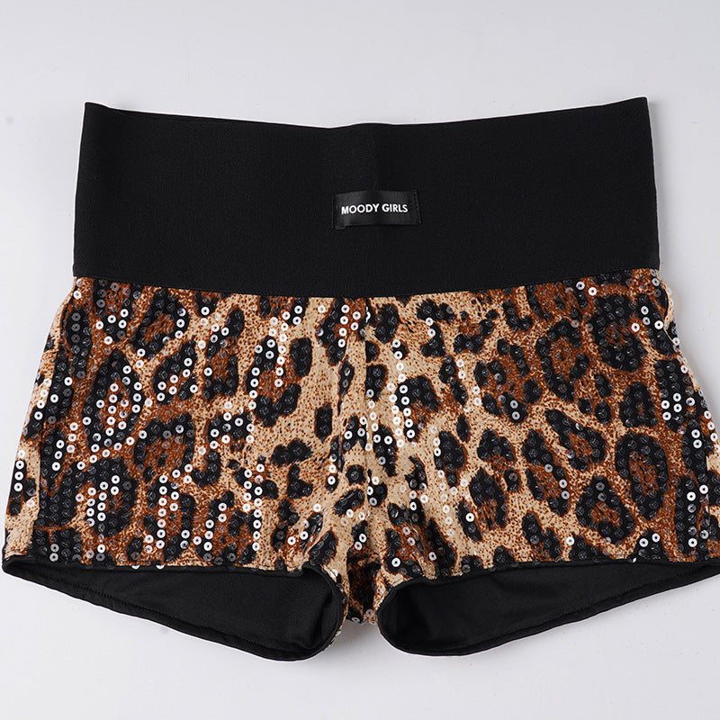Dame Glittrande Miniklänning med Leopardsmönster och Spaghettiöglor Mirla-Eva Jonsson