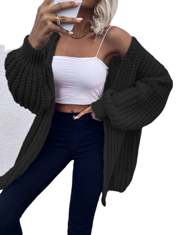 Dame Grovstickad cardigan med voluminösa ärmar och öppen framsida Mirla-Eva Jonsson