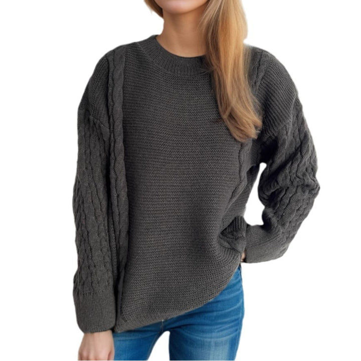 Dame Grovstickad tröja med eleganta flätmönster och avslappnad passform Eva Jonsson-Eva Jonsson
