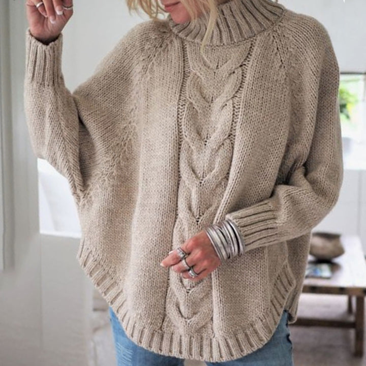 Dame Grovstickad tröja med kollektionsdesign och hög krage Eva Jonsson-Eva Jonsson