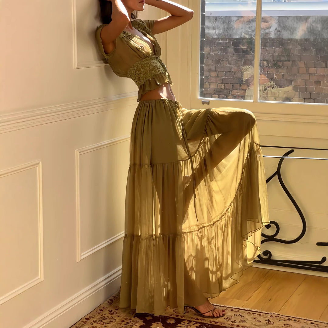 Dame Lätt Maxiklänning med eleganta volanger och transparent utseende Mirla-Eva Jonsson