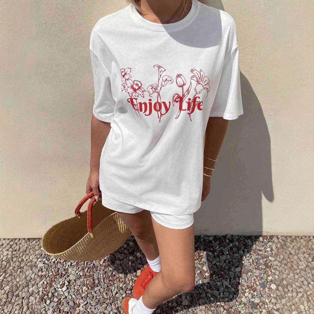 Dame Lätt oversized T-shirt med blommönster och inspirerande text Mirla-Eva Jonsson