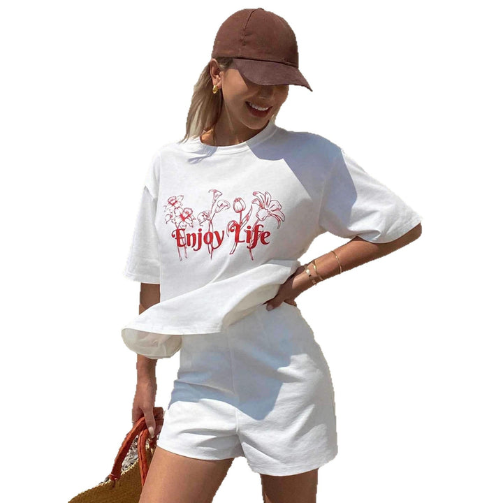 Dame Lätt oversized T-shirt med blommönster och inspirerande text Mirla-Eva Jonsson