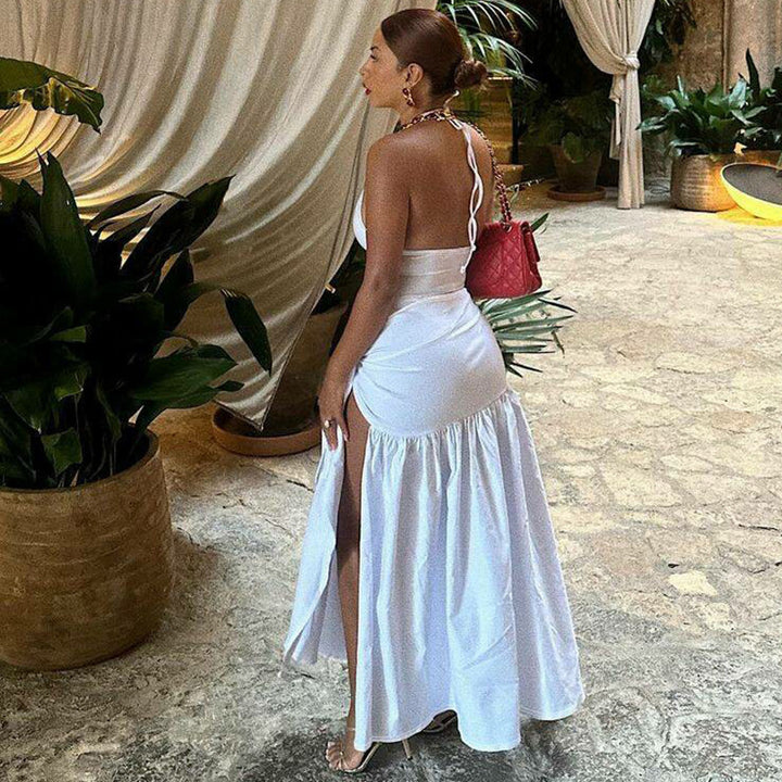 Dame Maxi dress med elegant omslagsdesign och sidofönster Mirla-Eva Jonsson