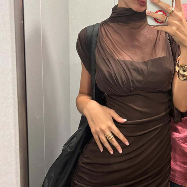 Dame Maxi-klänning med transparenta puffärmar och elegant rynkeffekt Mirla-Eva Jonsson