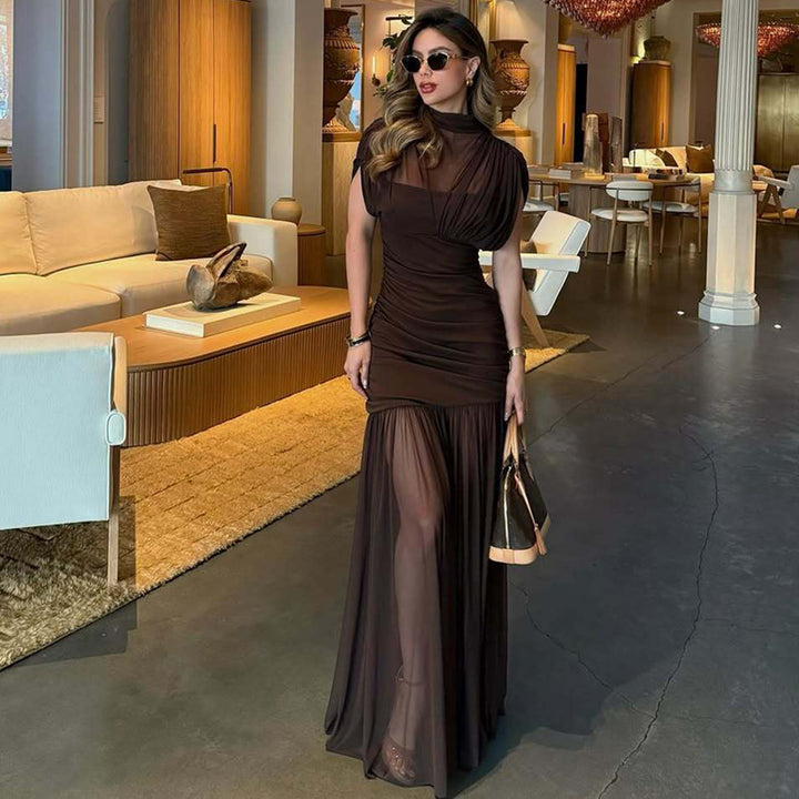 Dame Maxi-klänning med transparenta puffärmar och elegant rynkeffekt Mirla-Eva Jonsson