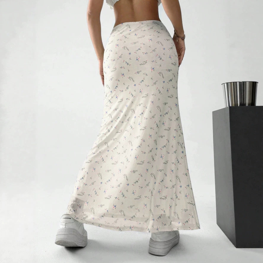 Dame Maxikjol med blommönster och elegant genomskinlighet Mirla-Eva Jonsson