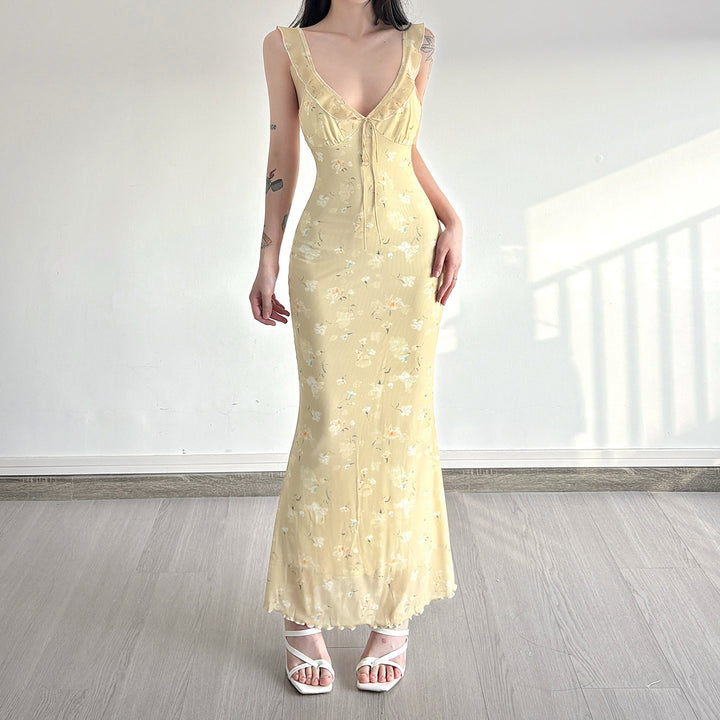 Dame Maxiklänning med blommigt mönster och justerbara band Mirla-Eva Jonsson