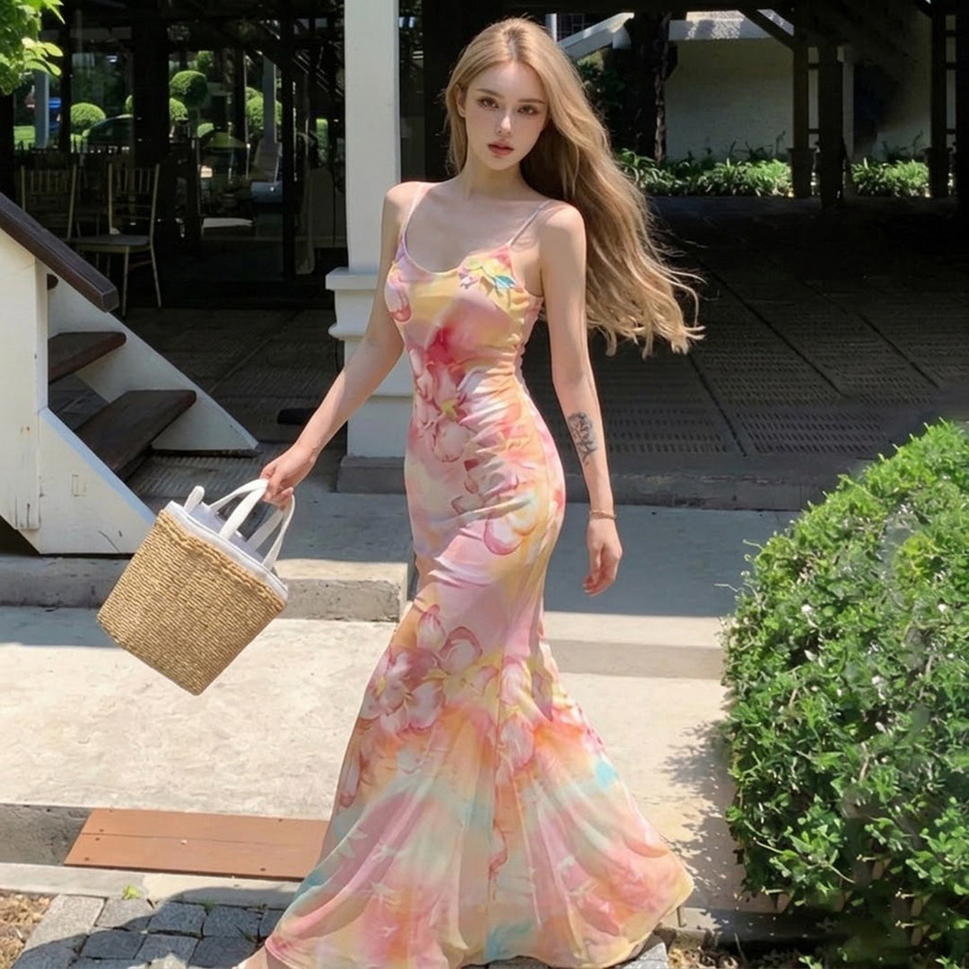 Dame Maxiklänning med blommigt mönster och spaghettiband Mirla-Eva Jonsson