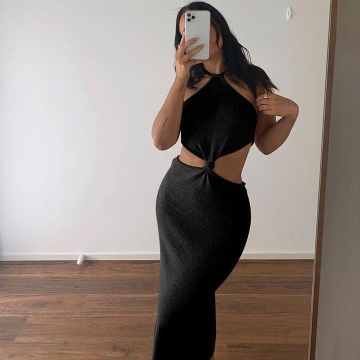 Dame Maxiklänning med cut-out design och elegant knutdetalj Mirla-Eva Jonsson