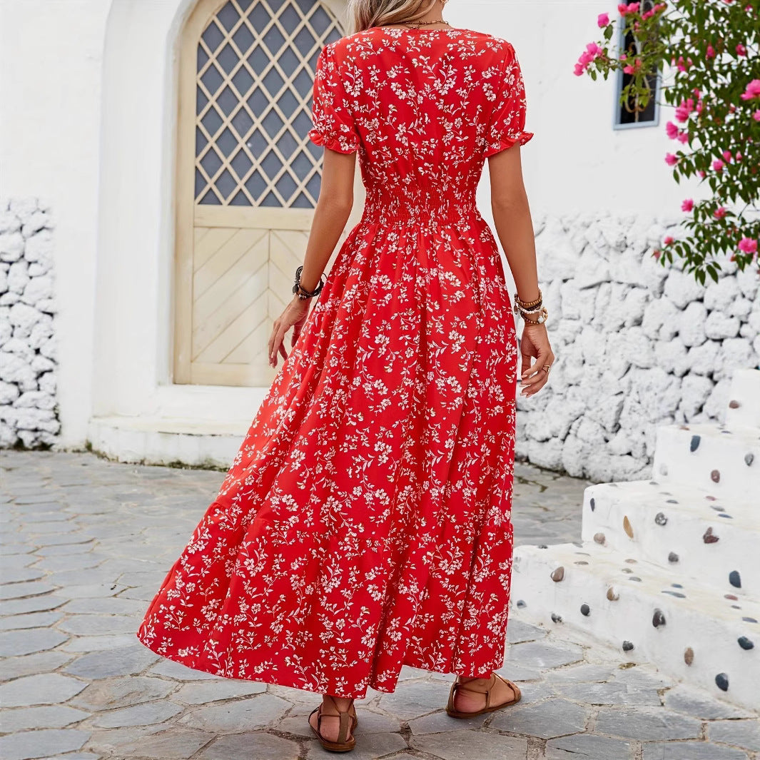 Dame Maxiklänning med elastisk midjesnörning och blomsterdetaljer Mirla-Eva Jonsson