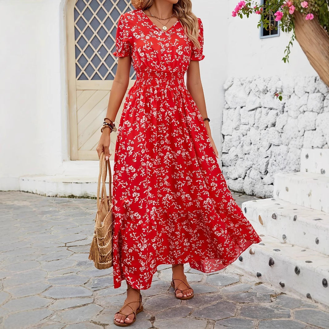 Dame Maxiklänning med elastisk midjesnörning och blomsterdetaljer Mirla-Eva Jonsson