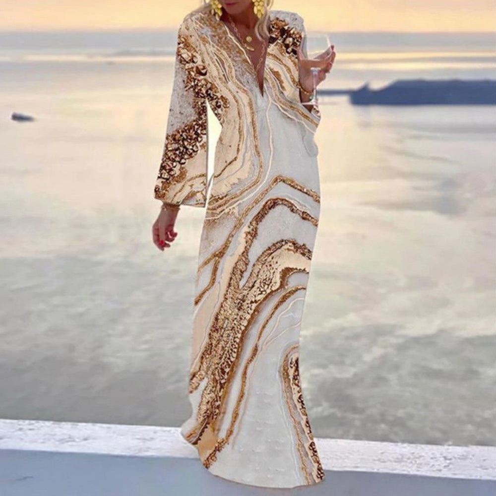 Dame Maxiklänning med elegant V-halsning och flödande snitt Mirla-Eva Jonsson