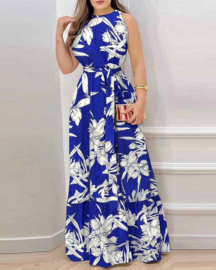 Dame Maxiklänning med elegant blommönster och figursydd design Eva Jonsson-Eva Jonsson