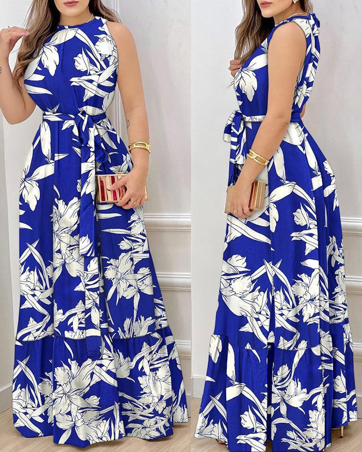 Dame Maxiklänning med elegant blommönster och figursydd design Eva Jonsson-Eva Jonsson
