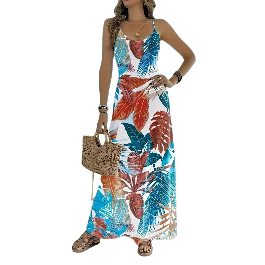 Dame Maxiklänning med elegant blommönster och smala axelband Eva Jonsson-Eva Jonsson