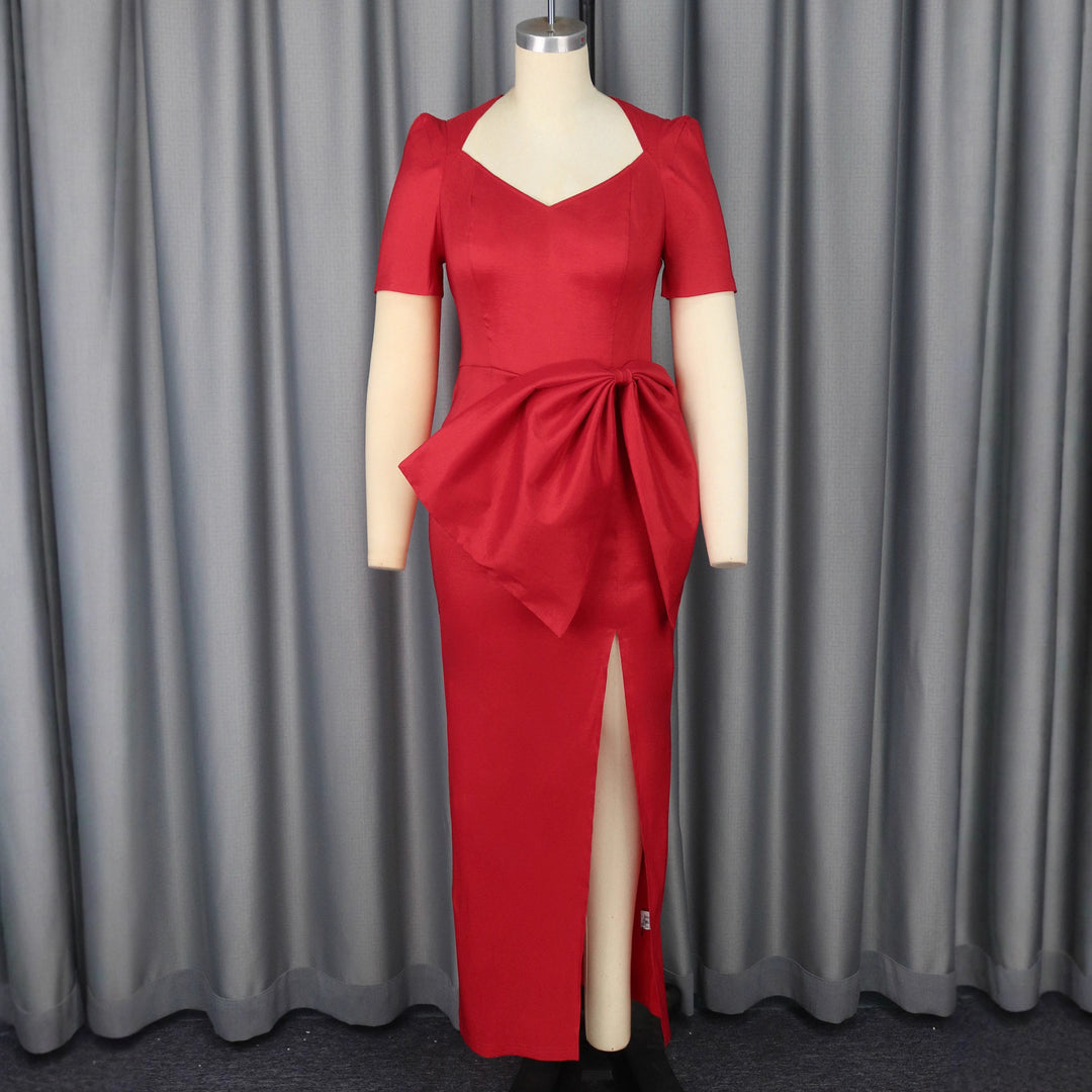 Dame Maxiklänning med elegant drapering och voluminös kjol Mirla-Eva Jonsson