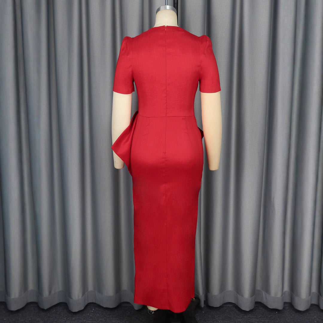 Dame Maxiklänning med elegant drapering och voluminös kjol Mirla-Eva Jonsson