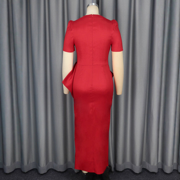 Dame Maxiklänning med elegant drapering och voluminös kjol Mirla-Eva Jonsson