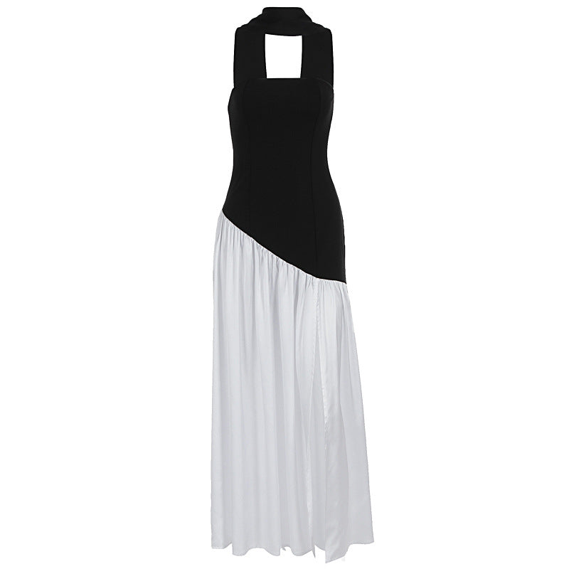 Dame Maxiklänning med elegant off-shoulder design och asymmetrisk skärning Mirla-Eva Jonsson